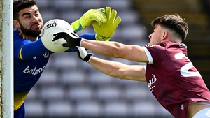 Tomo Culhane scores Galway's second goal past Colm Lavin