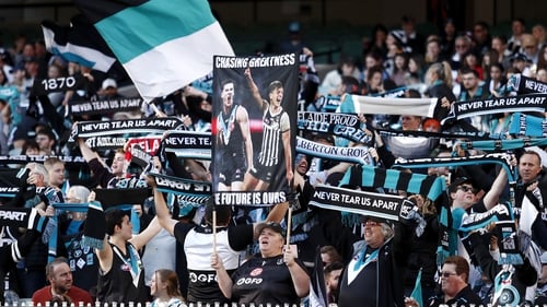Port Adelaide fans pictured during the AFL clash at the Melbourne Cricket Ground