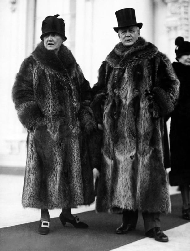 Postmaster General and Mrs Harry New leaving the White House after the New Year reception, Washington DC, January 2, 1928. Their coon skin coats of collegiate fame attracted considerable attention among the more somber formal wear of the other Cabinet members. (Photo by Underwood Archives/Getty Images)