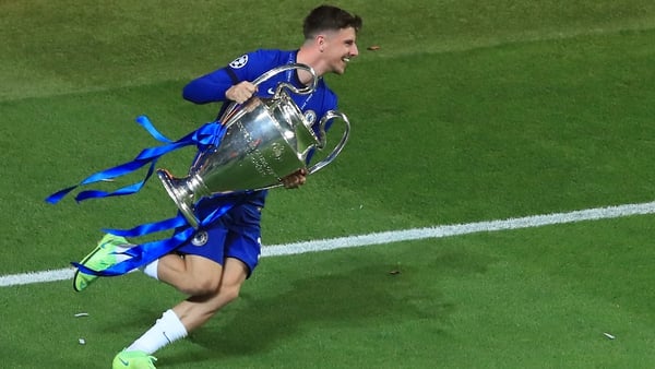 The England midfielder with his hands on the Champions League trophy