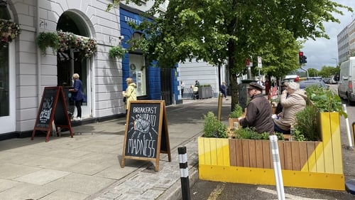 One of the city council sponsored 12 so-called 'parklets' outside the Imperial Hotel