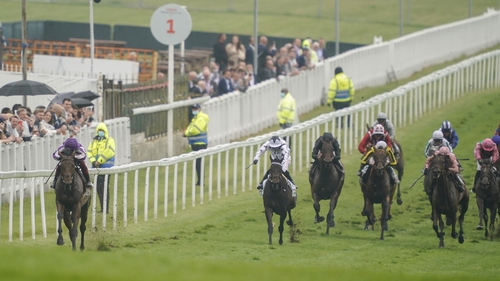 Snowfall (l) powers clear to win at Epsom at 4 June