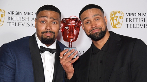 Jordan Banjo (L) and Ashley Banjo, accepting the Must-See Moment award for Diversity's performance on Britain's Got Talent