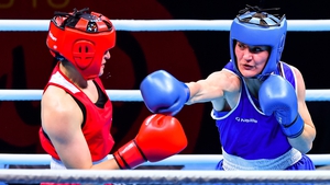 Former world champion Kellie Harrington (R) will compete at the Olympics for the first time