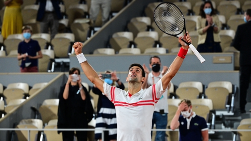 Novak Djokovic celebrates his rare feat
