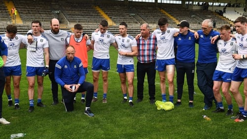 Monaghan players and management after surving for another year in the top flight