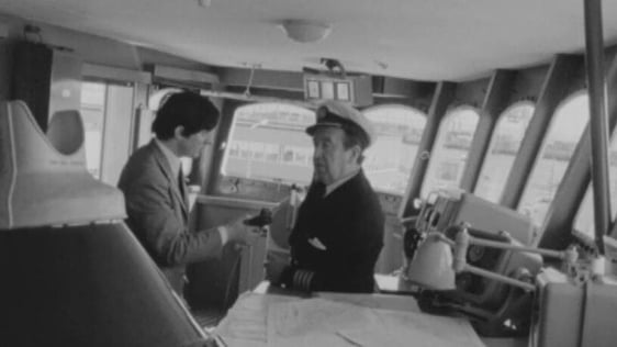 RTÉ reporter Tom MacSweeney interviews a ship's captain in Dublin Port (1971)