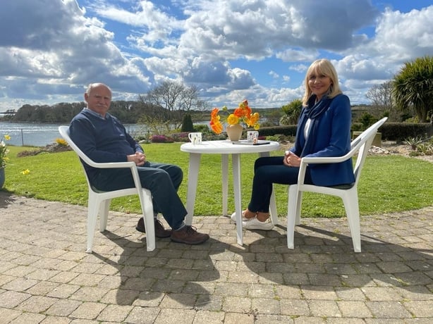 Billy Kohner at a table with Miriam O'Callaghan