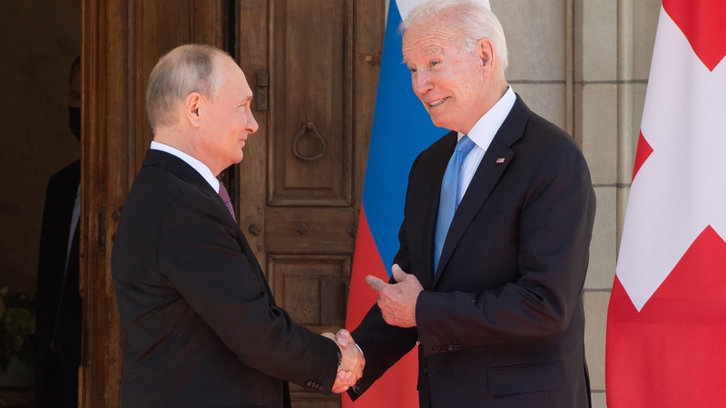 US President Joe Biden and Russian President Vladimir Putin shake hands as they arrive at Villa La Grange in Geneva