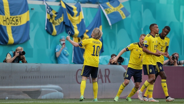 Emil Forsberg celebrates after scoring Sweden's goal from the spot