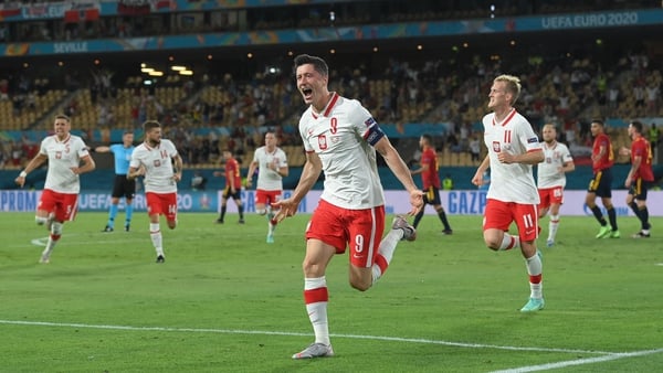 Robert Lewandowski headed home a second half equalizer to keep Poland's hopes of progressing alive