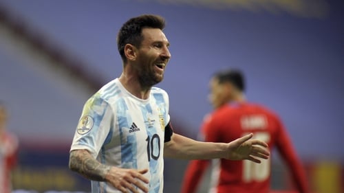 Messi celebrates Alejandro Gomez's goal against Paraguay