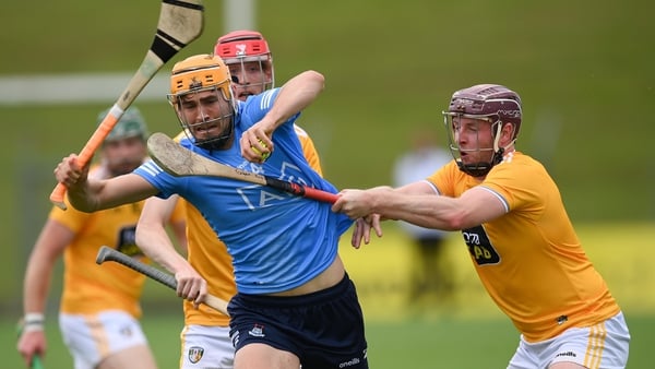 Ronan Hayes of Dublin in action against Antrim's Eoghan Campbell.