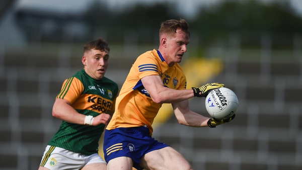 Pearse Lillis of Clare in action against Dara Moynihan of Kerry