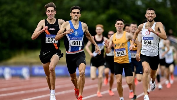Andrew Coscoran, second from left, wins the men's 1500m