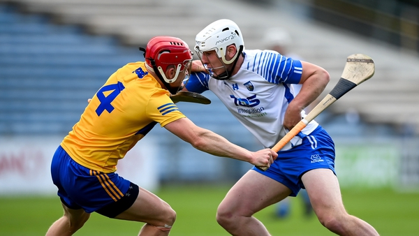 Shane Bennett of Waterford in action against Paul Flanagan of Clare