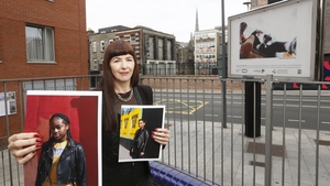 Photographer Mandy O Neill holds two of her images that will feature as part of the Diversity in Dublin exhibition (Pics: RollingNews.ie)