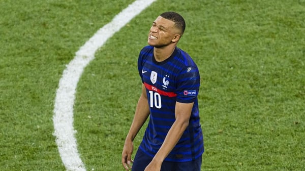 The agony of his penalty shootout miss is etched on the face of Kylian Mbappe