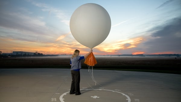 Meteorologist Carrie Suffern releases a weather balloon. Photo: Benjamin C. Tankersley for The Washington Post via Getty Images