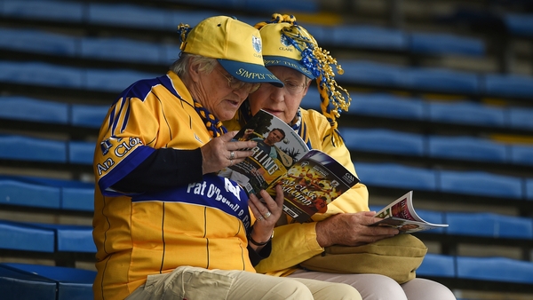 Clare supporters Eileen Callinan and Mary O'Connell check the match programme prior to the 2018 All-Ireland hurling semi-final replay between Galway and Clare at Semple Stadium. Photo: Diarmuid Greene/Sportsfile