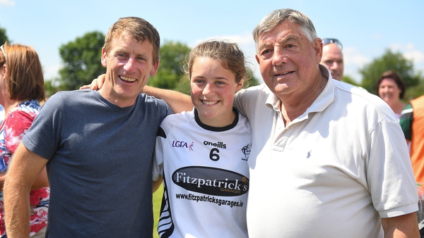 Former champion jockey Johnny Murtagh with his daughter Lauren and his father-in-law, Tipperary's Michael 'Babs' Keating, after Kildare's win over Waterford in the All-Ireland Minor B Ladies football semi-final match in 2018