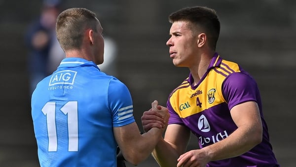 Eoin Porter of Wexford and Con O'Callaghan after the game