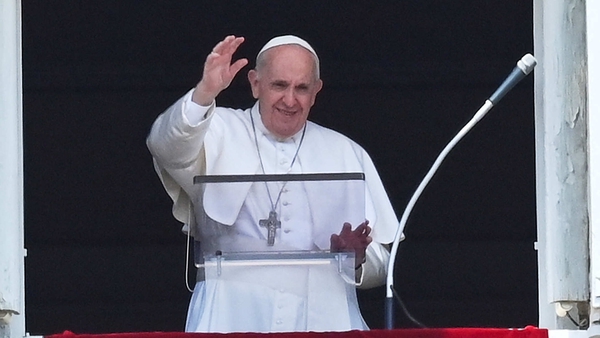 Pope Francis waving to crowds in Rome yesterday just hours before surgery