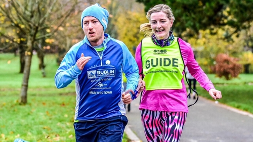 Ross Gallagher with guide Ellen Mulcahy Lynch at a Tralee parkrun before the pandemic.