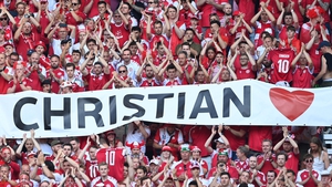 Denmark fans pay tribute to Christian Eriksen during the match against Belgium