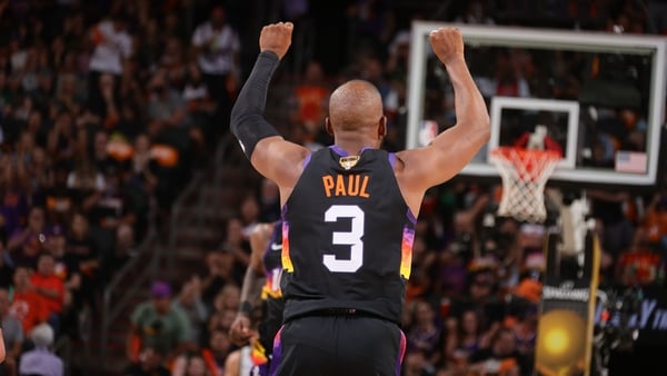 Chris Paul celebrates at the buzzer as the Suns open the series with a victory