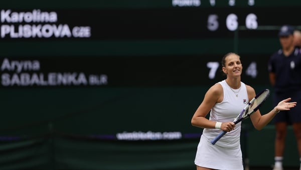 The scoreboard lights up with Karolina Pliskova's name as she edges out Aryna Sabalenka on Centre Court