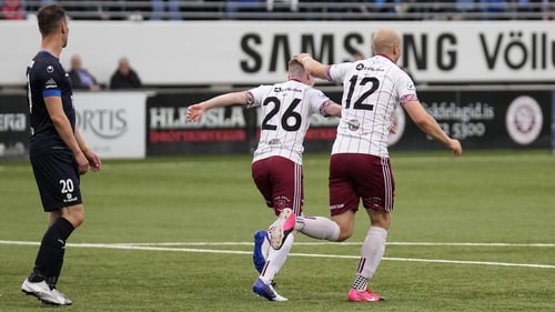 Bohs goalscorer Ross Tierney is congratulated by his team-mate Georgie Kelly in Reykjavik