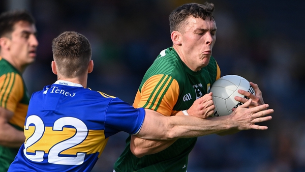 David Clifford of Kerry is tackled by Tipp's Jason Lonergan.