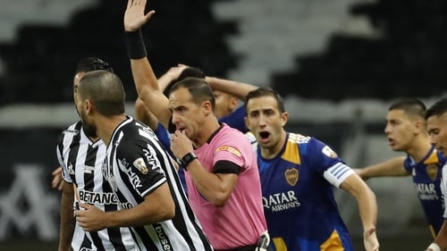 Boca players were not happy with the referee