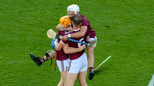 A euphoric Tommy Gallagher jumps on Niall Mitchell and Tommy Boyle after the final whistle at Croke Park on Saturday