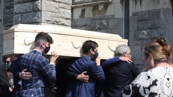Des O'Malley's coffin is seen arriving at the Church of the Sacred Heart in Donnybrook, Dublin