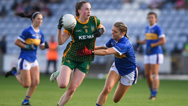 Meath's Aoibhin Cleary gets past the challenge of Tipperary's Elaine Kelly