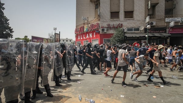 Police clashed with protesters in a number of cities across Tunisia
