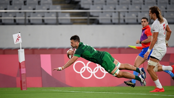 Harry McNulty of Ireland scores a try during the Pool C match against the USA