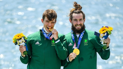 Fintan McCarthy, left, and Paul O'Donovan celebrate their gold medal