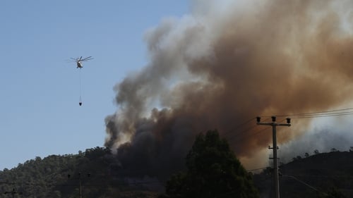 Helicopters battle forest fires in Turkey