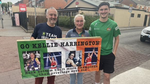 Kellie Harrington's father Christy, mother Yvonne and brother Christopher celebrate outside their Dublin home