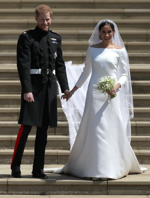 Prince Harry and Meghan Markle leave St George's Chapel in Windsor Castle after their wedding