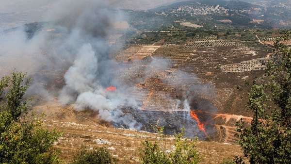 Smoke billows in the towns of Ibl Al-Saqi and Kfar Hamam in southern Lebanon