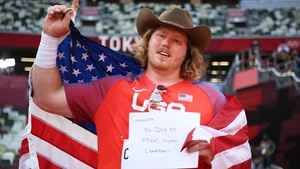 American Ryan Crouser set a new Olympic record in the shot put final