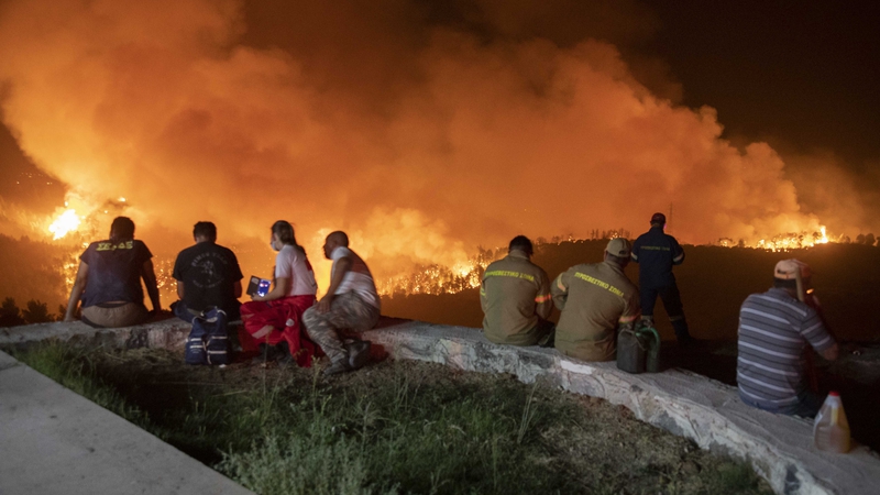 Residents are evacuated from the Greek island of Evia due to huge wildfires, a consequence of climate change. Photo: Nicolas Economou/NurPhoto via Getty Images