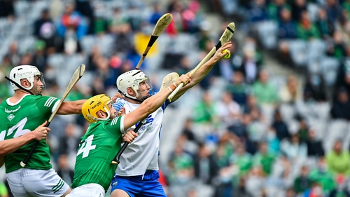 Shane Bennett of Waterford in action against Séamus Flanagan of Limerick