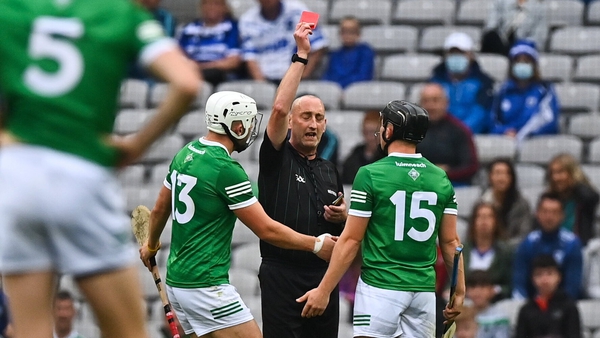 Referee John Keenan shows a red card to Peter Casey of Limerick