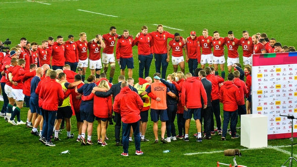 The Lions huddle after the match