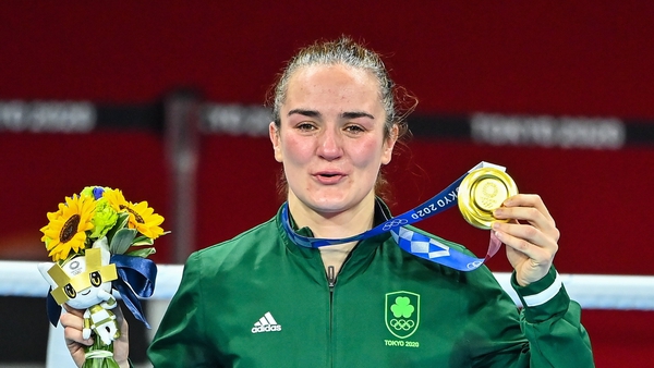 Kellie Harrington atop the Olympic podium with her gold medal